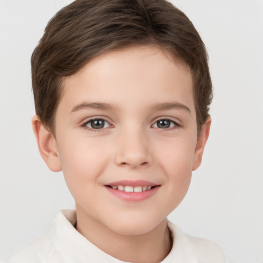 Joyful white child female with short  brown hair and brown eyes