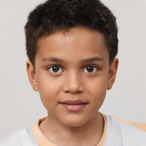 Joyful white child male with short  brown hair and brown eyes