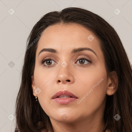 Neutral white young-adult female with long  brown hair and brown eyes