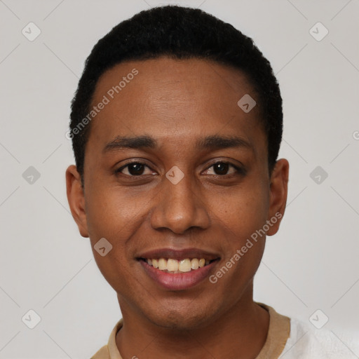 Joyful black young-adult male with short  black hair and brown eyes