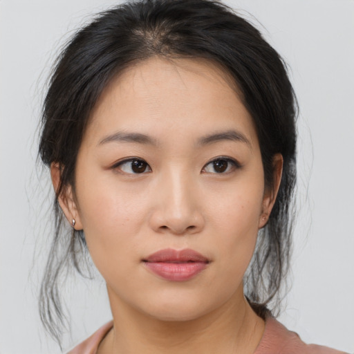 Neutral asian young-adult female with medium  brown hair and brown eyes