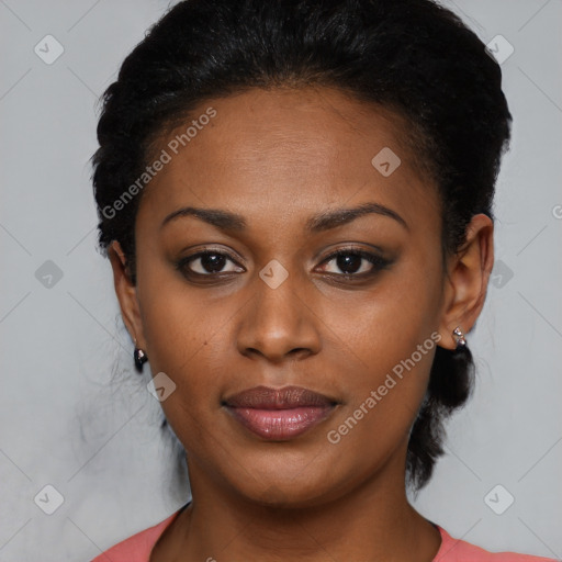 Joyful black young-adult female with medium  black hair and brown eyes