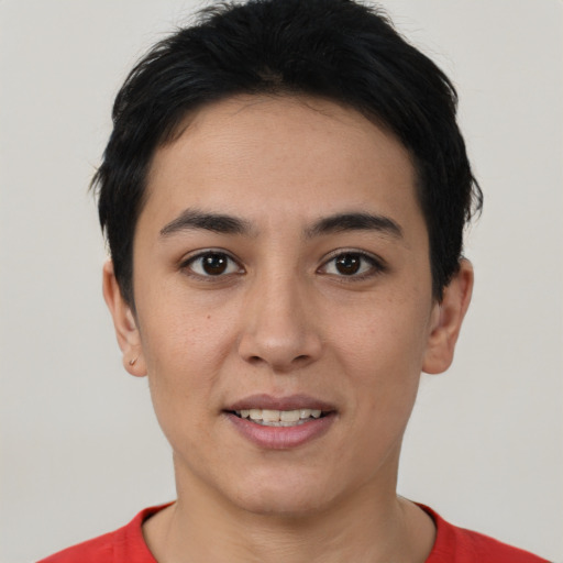 Joyful white young-adult female with short  black hair and brown eyes