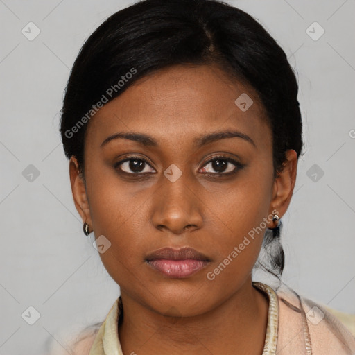 Neutral black young-adult female with short  black hair and brown eyes