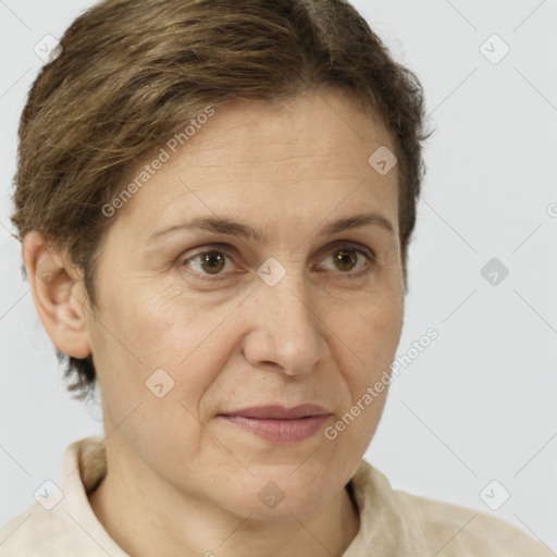 Joyful white adult female with short  brown hair and brown eyes