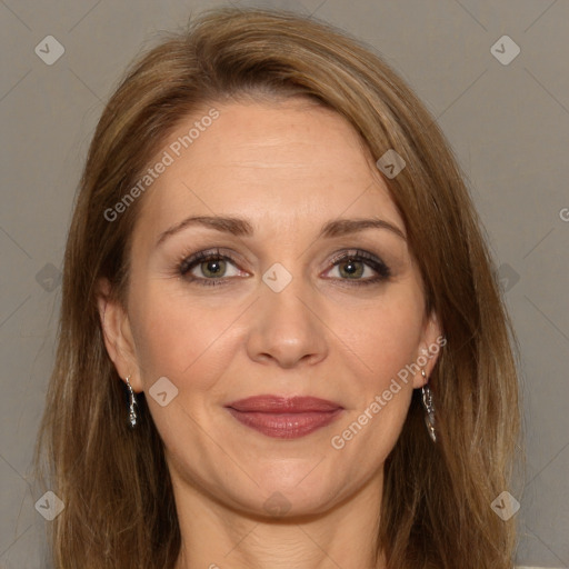 Joyful white adult female with long  brown hair and brown eyes