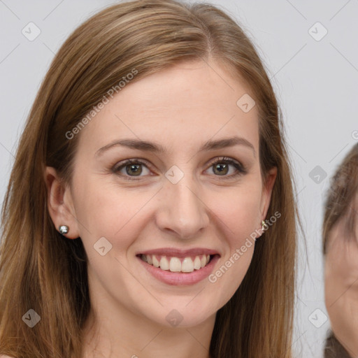 Joyful white young-adult female with long  brown hair and grey eyes