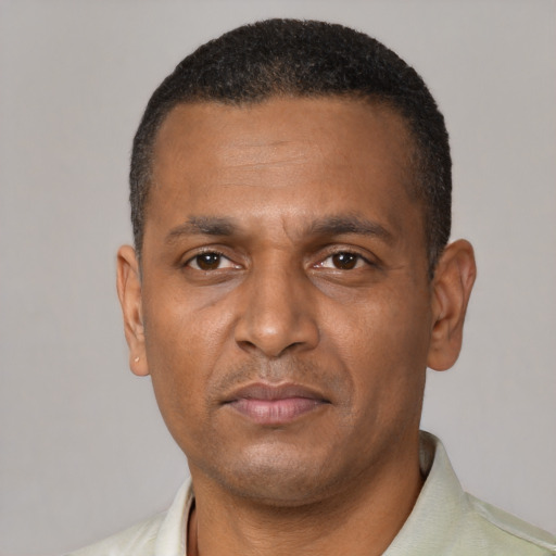 Neutral black adult male with short  brown hair and brown eyes