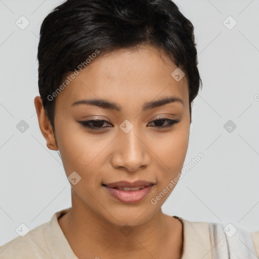 Joyful latino young-adult female with short  brown hair and brown eyes