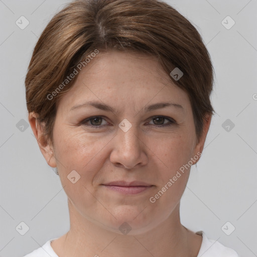 Joyful white young-adult female with short  brown hair and grey eyes