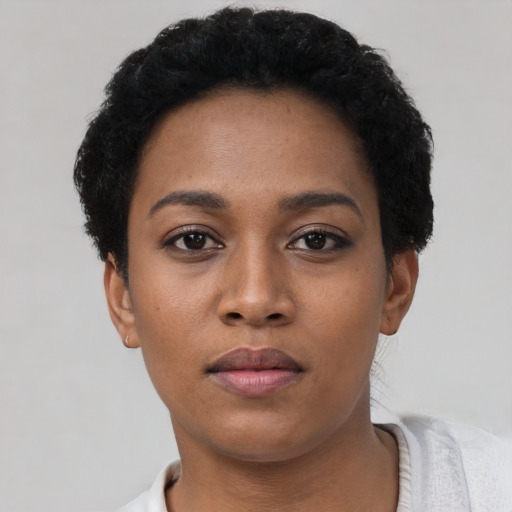 Neutral black young-adult female with short  black hair and brown eyes