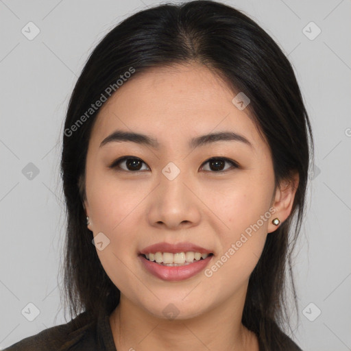 Joyful asian young-adult female with long  brown hair and brown eyes