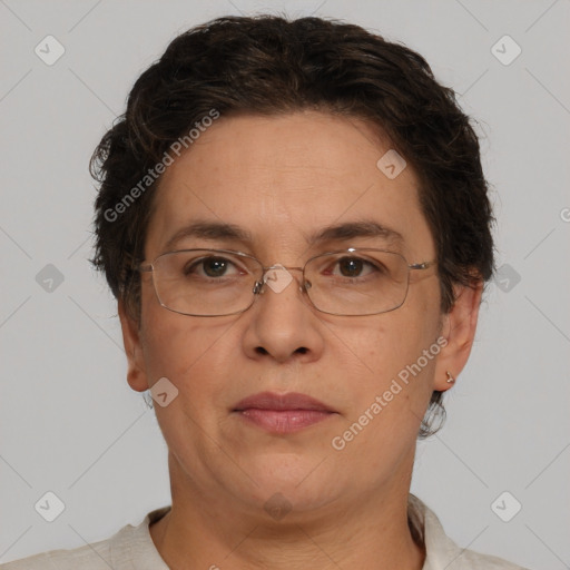 Joyful white adult female with short  brown hair and brown eyes