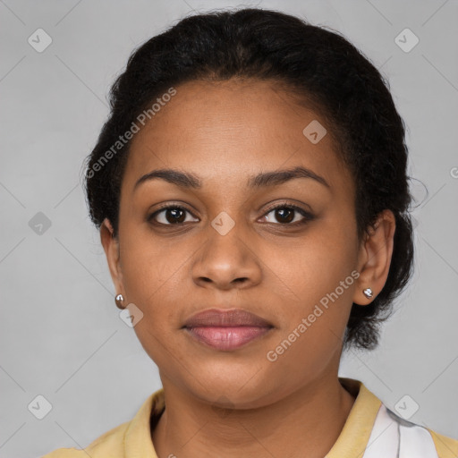 Joyful latino young-adult female with short  brown hair and brown eyes