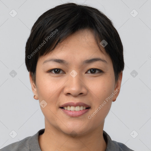 Joyful asian young-adult female with short  black hair and brown eyes