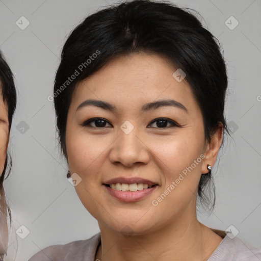 Joyful asian young-adult female with medium  brown hair and brown eyes