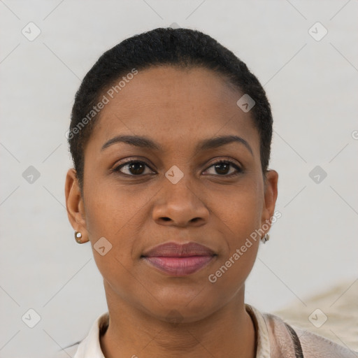 Joyful black young-adult female with short  brown hair and brown eyes