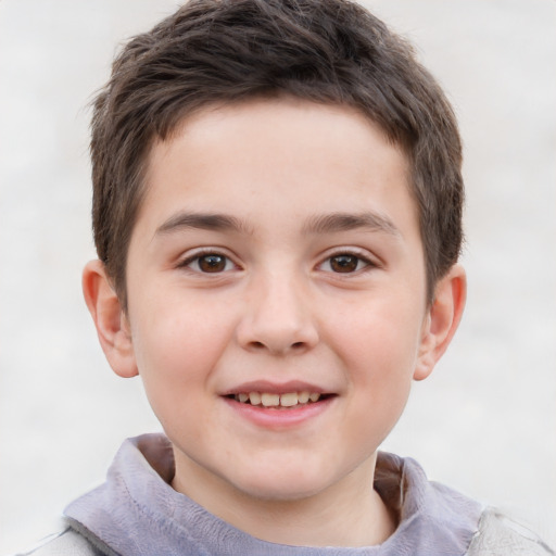 Joyful white child male with short  brown hair and brown eyes