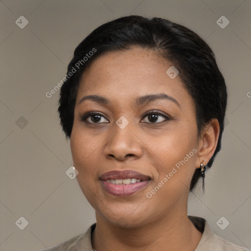 Joyful black young-adult female with medium  black hair and brown eyes