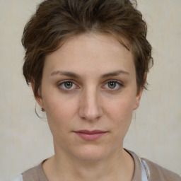 Neutral white young-adult female with short  brown hair and brown eyes