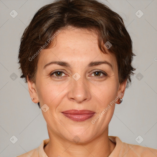 Joyful white adult female with short  brown hair and brown eyes