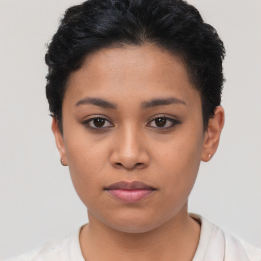 Neutral latino young-adult female with short  black hair and brown eyes
