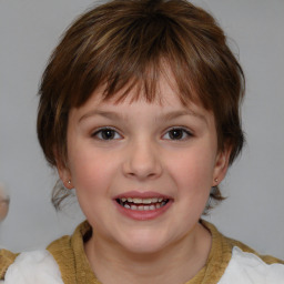 Joyful white child female with medium  brown hair and brown eyes