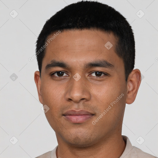 Neutral latino young-adult male with short  black hair and brown eyes