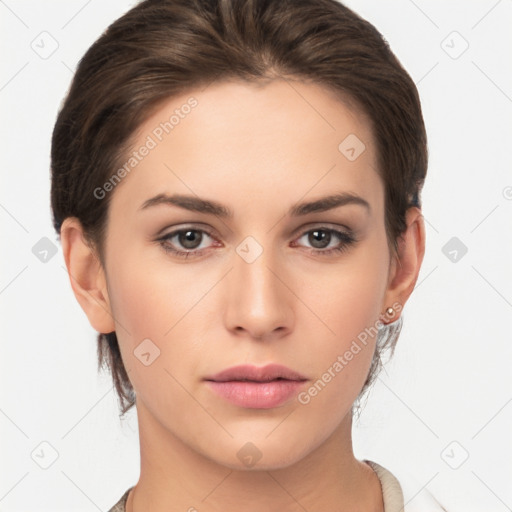 Neutral white young-adult female with medium  brown hair and brown eyes