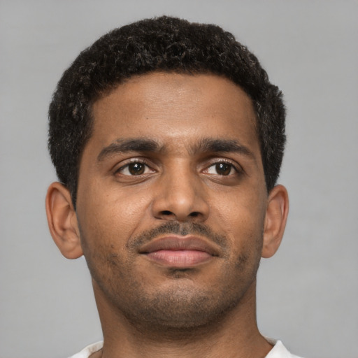 Neutral black young-adult male with short  brown hair and brown eyes