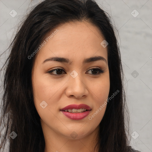 Joyful asian young-adult female with long  brown hair and brown eyes