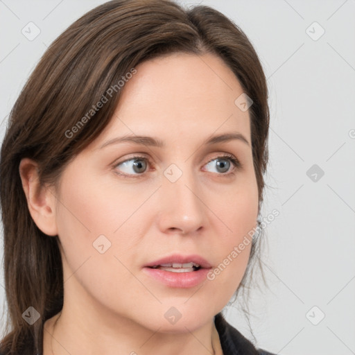 Neutral white young-adult female with medium  brown hair and grey eyes