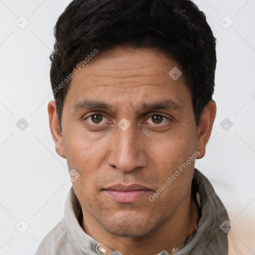 Neutral white adult male with short  brown hair and brown eyes