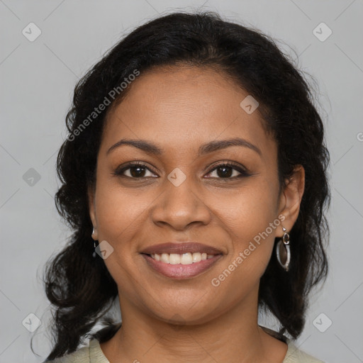 Joyful black young-adult female with medium  brown hair and brown eyes