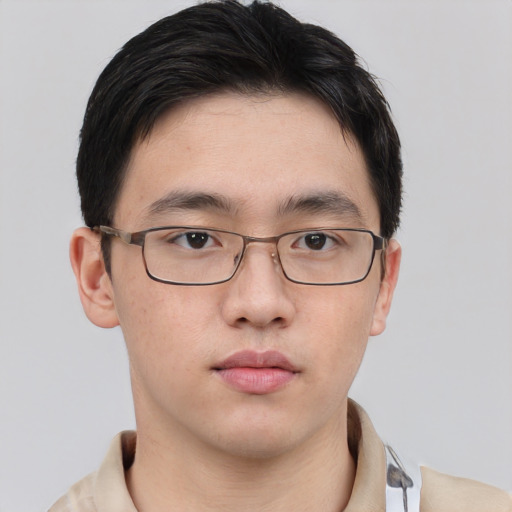 Neutral asian young-adult male with short  brown hair and brown eyes