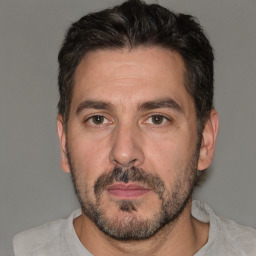 Neutral white adult male with short  brown hair and brown eyes