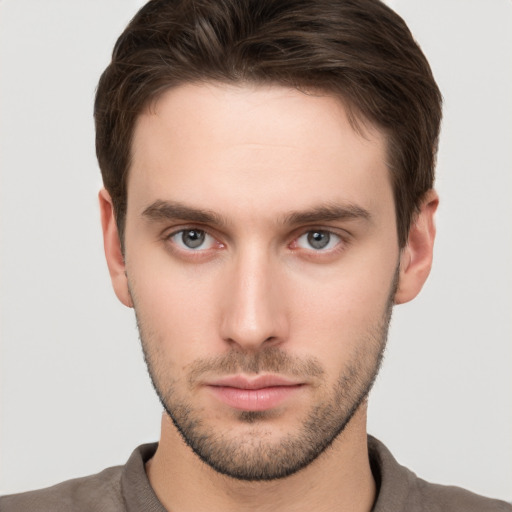 Neutral white young-adult male with short  brown hair and brown eyes