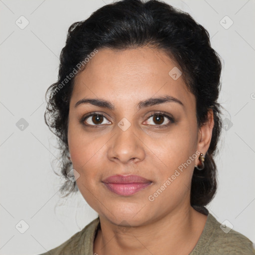 Joyful latino young-adult female with medium  brown hair and brown eyes