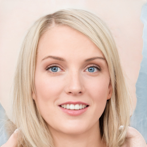 Joyful white young-adult female with long  brown hair and blue eyes