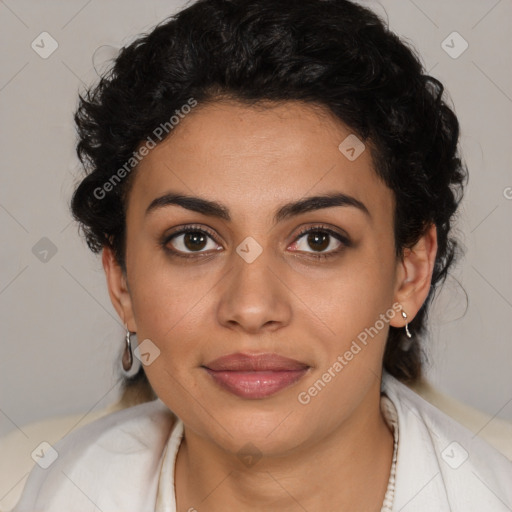 Joyful latino young-adult female with medium  brown hair and brown eyes