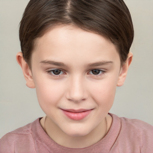 Joyful white child female with short  brown hair and brown eyes