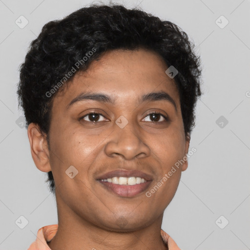 Joyful black young-adult male with short  brown hair and brown eyes