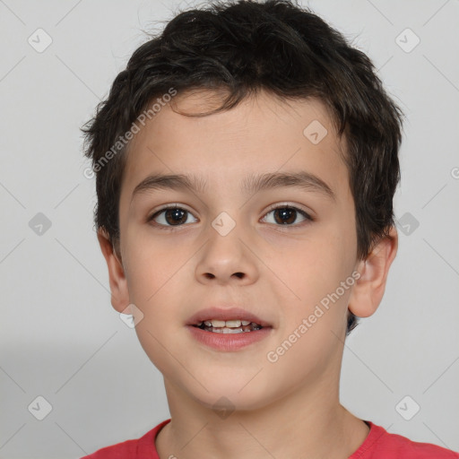 Joyful white child male with short  brown hair and brown eyes