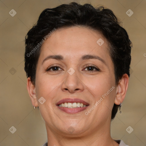 Joyful white adult female with short  brown hair and brown eyes