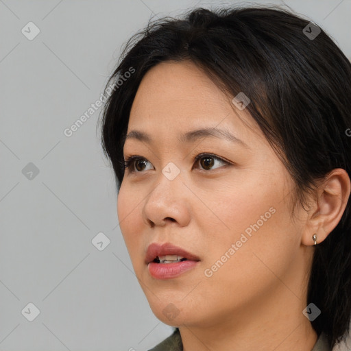 Neutral white young-adult female with medium  brown hair and brown eyes