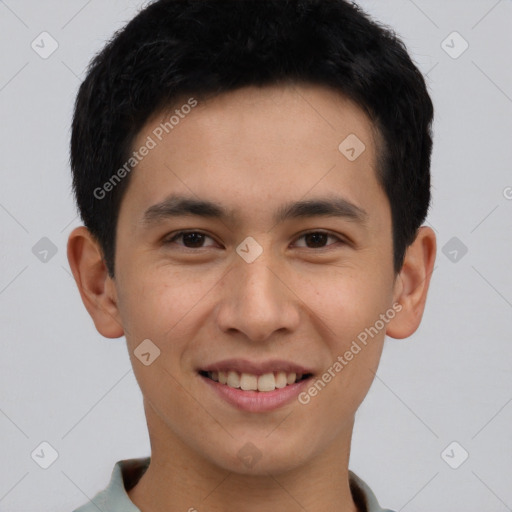 Joyful white young-adult male with short  black hair and brown eyes