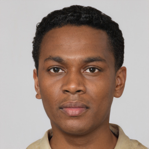Neutral black young-adult male with short  black hair and brown eyes