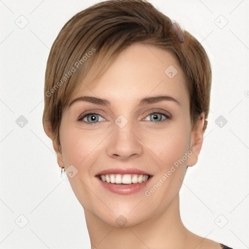 Joyful white young-adult female with short  brown hair and grey eyes