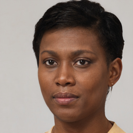Neutral black young-adult female with short  brown hair and brown eyes