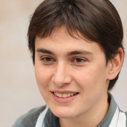 Joyful white young-adult male with medium  brown hair and brown eyes